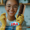 Smiling woman in yellow gloves holding Lola hand scrub brush in kitchen, American owned and operated since 1969
