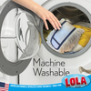 Hand placing Lola dust mop refill head in washing machine with clothes; text: Machine Washable, American family owned & operated since 1969