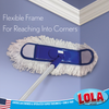 Lola Flexible Dust Mop head bent at wall corner, demonstrating flexible frame for reaching corners; American Owned & Operated