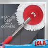 Revolution spin mop head cleaning floor corner on dark tile surface