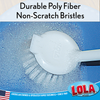 Durable poly fiber non-scratch cleaning brush bristles close-up in soapy water for gentle scrubbing