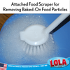 Attached food scraper on dish brush removes baked-on food particles while scrubbing in soapy water