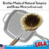 Replacement scrub brush head being snapped onto pot and pan dish brush handle for kitchen cleaning