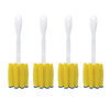 Four Lola glass jar brushes with white plastic handles, yellow foam sponge heads and blue fiber scrubber tips arranged in a row