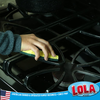 Sponge and scourer scrubbing a glass baking dish during kitchen cleaning and dishwashing cleanup