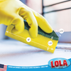 Hand in yellow glove holding Scour N Sponge cleaning pad, dimensions 4" x 2.75" x 1.25