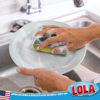 Scour N sponge washing a dish at the kitchen sink for everyday dishwashing and kitchen cleaning
