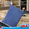 Lola sponge pad blue terry side on kitchen granite countertop near oven; won't scratch most surfaces, 0.5 x 3.5 x 0.625 in.