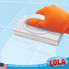 Be Clean. Be Happy. gloved hand using white bath tile scrubber to clean bathroom floor tile grout