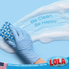 Be Clean. Be Happy. gloved hand using blue and white patterned cleaning cloth to wipe surface with soap suds streak