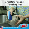 Great for a range of scrubbing jobs: hand using blue cellulose sponge to scrub inside a decorative ceramic bowl at kitchen sink
