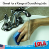 Great for a range of scrubbing jobs: hand using blue cellulose sponge to clean around chrome bathroom sink faucet