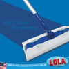 Lola Dry Sweeping Cloth attached to a sweeper mop cleaning a hard floor