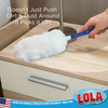 Duster picking up dust and dirt from a nightstand surface for quick furniture cleaning and dust removal