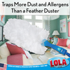 Large fluffy white duster head in living room traps more dust and allergens than a feather duster