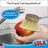 The Original Lola Vegetable Brush with natural Tampico fiber bristles and replacement head scrubbing a red apple under water